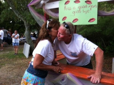 Grant's wife, Jamie, got in line for her kiss with the man of honor.
